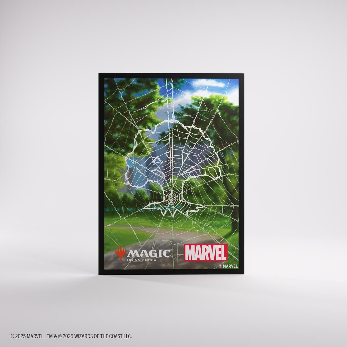Framed artwork with spider web Forest design and Marvel and Magic the Gathering logos on a white background