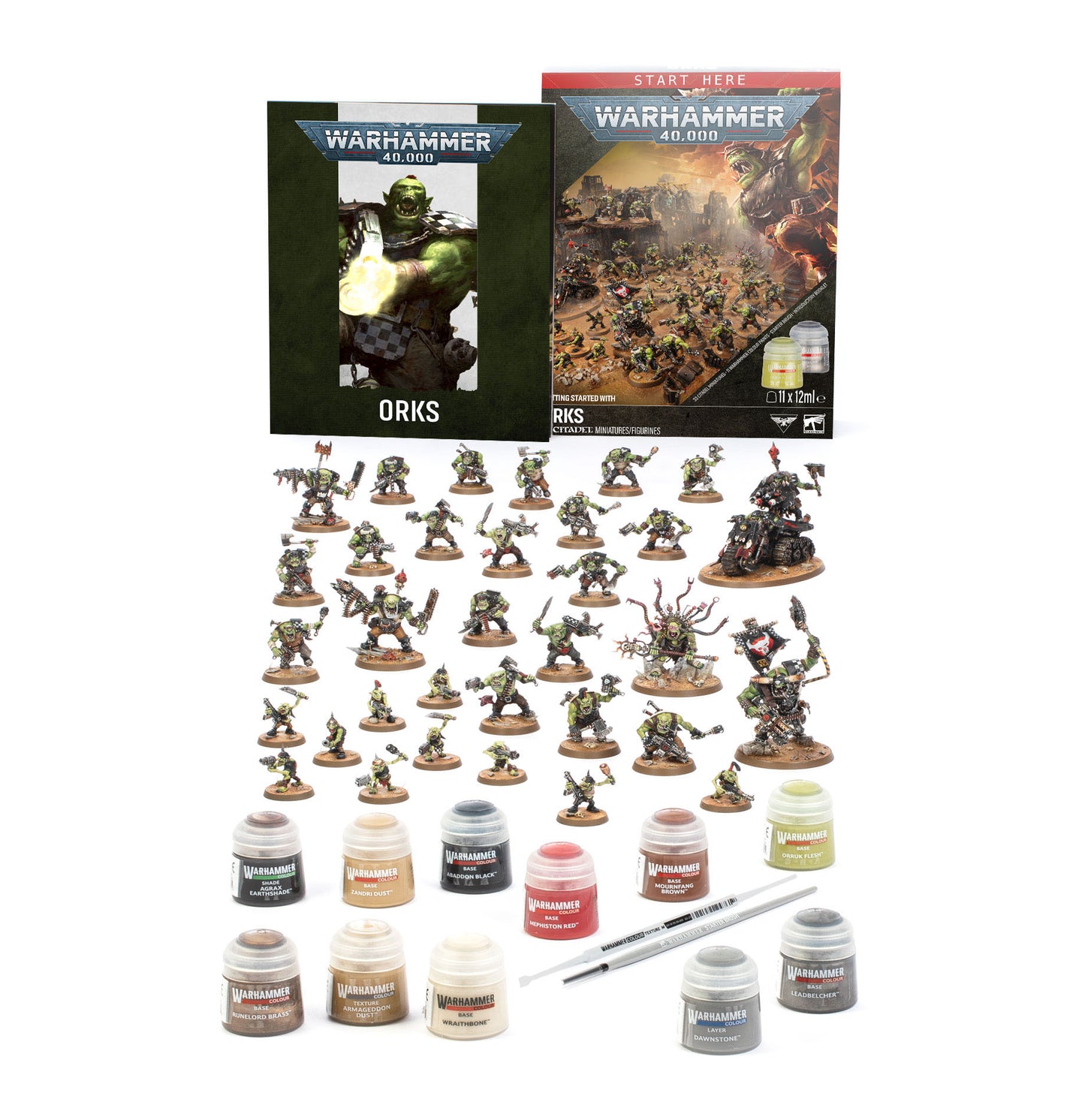 Warhammer 40k miniatures kit with multiple painted fantasy terrain miniatures, a set of unpainted plastic terrain pieces, several small paint bottles, a brush, and two Warhammer booklets on a plain white background.