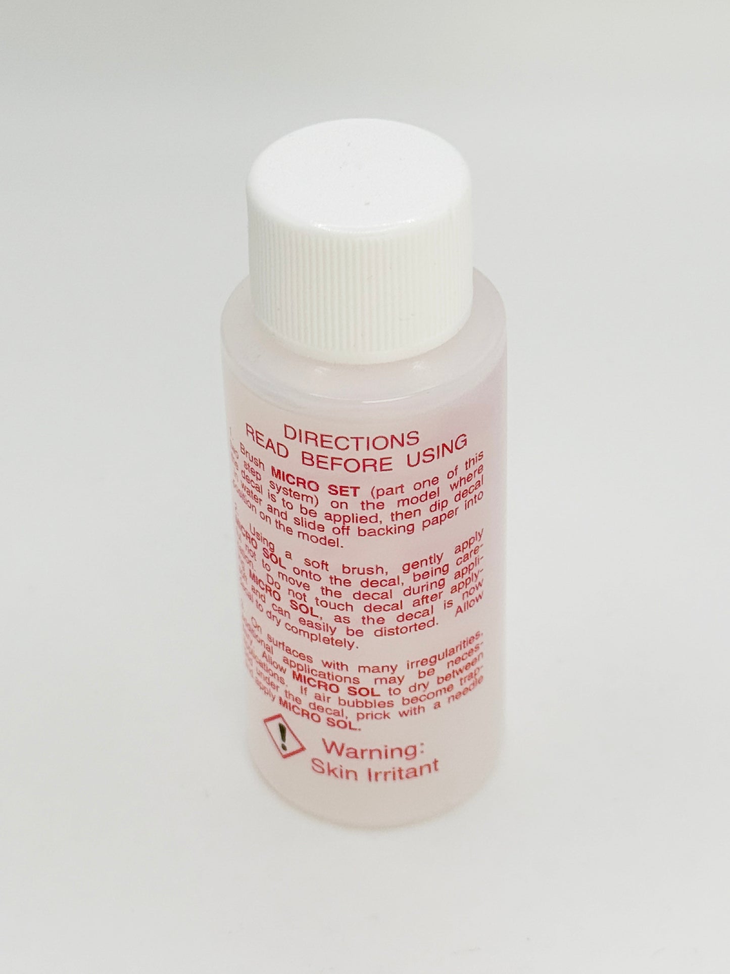 Microscale Micro Sol MI-2 decal setting solution bottle for model kits—softens decals for a painted-on finish—modeling supplies made in the USA.