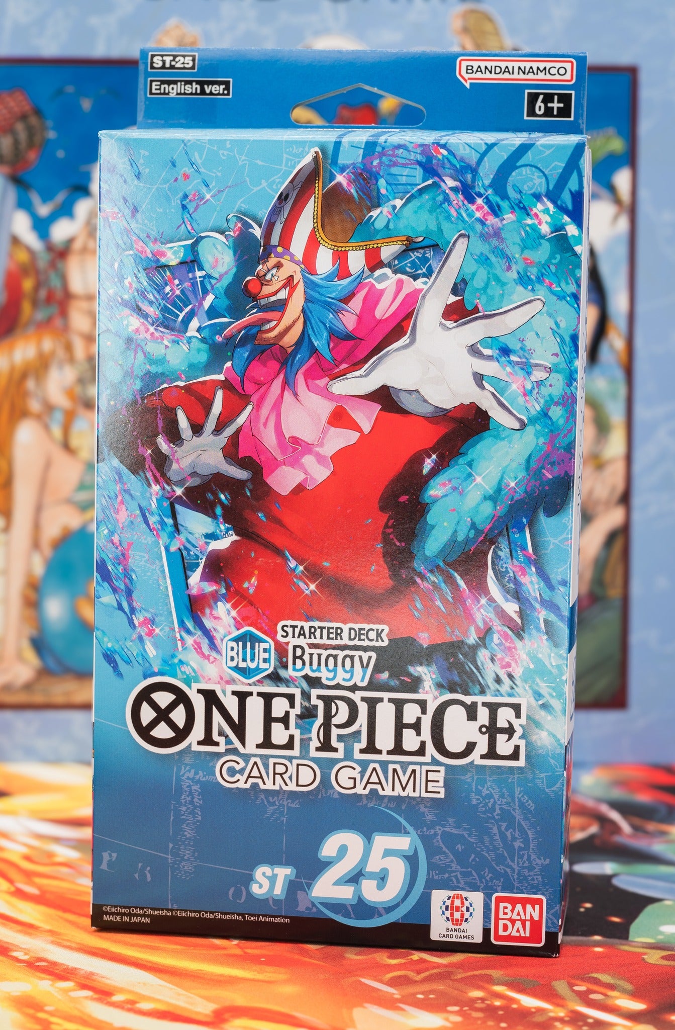 One Piece Card Game Starter Deck ST-25 featuring Buggy the Clown – English version by Bandai Namco, colorful packaging with dynamic anime artwork, blue and red theme, suitable for ages 6+