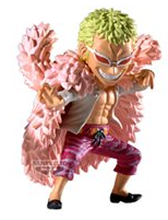 Action figure with green hair and pink outfit on a white background