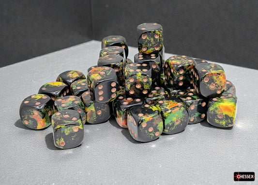 Set of Chessex dice with camouflage pattern and gold pips on a gray surface