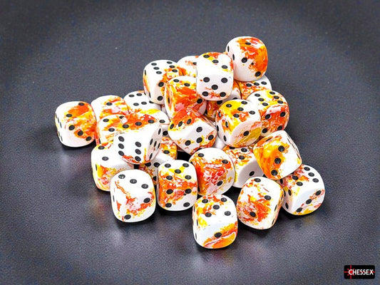 Set of white dice with orange and yellow brushed design with black pips on a dark surface, featuring the Chessex brand.