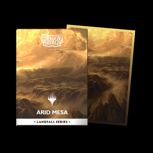 Photo of card sleeves and a box depicting Arid Mesa with a Dragon Shield logo