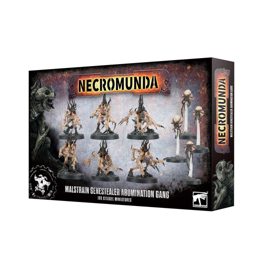 Boxed set of Necromunda Malstrain Genestealer Abomination Gang miniatures, featuring six small plastic figures with different head and tentacle designs, and four larger plastic figures.