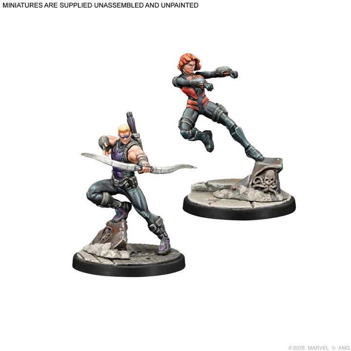 Two miniature figures on stands with a white background