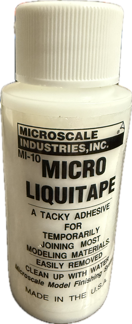 Bottle of Micro Liquitape adhesive with label on a white background