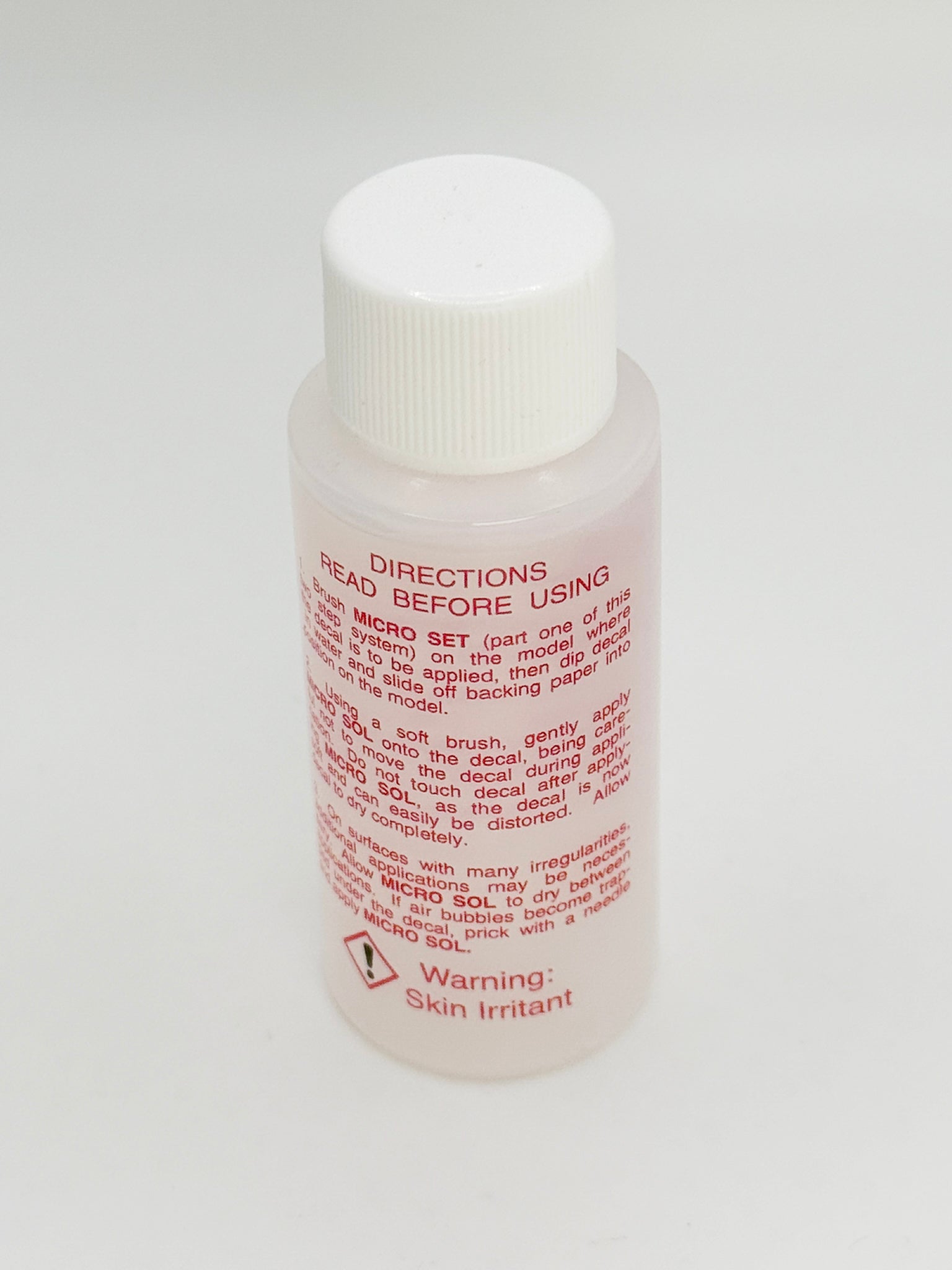 Microscale Micro Sol MI-2 decal setting solution bottle for model kits—softens decals for a painted-on finish—modeling supplies made in the USA.