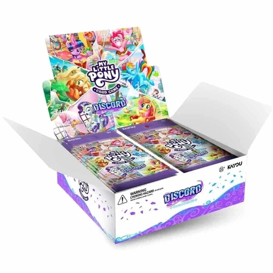 Open box of My Little Pony trading card packs with colorful packaging.