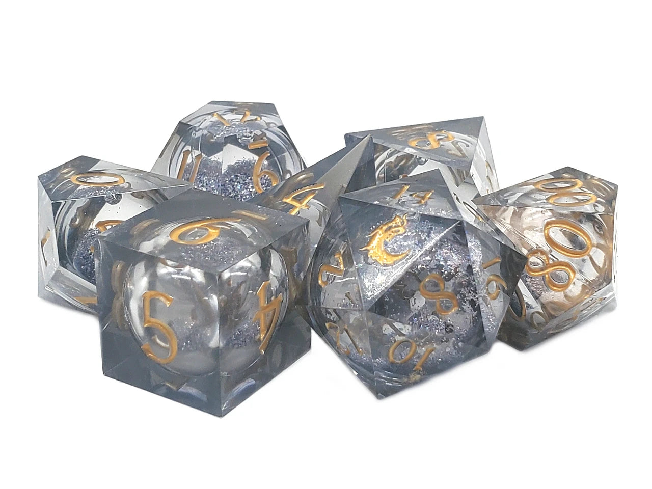 Set of clear dice with gold numbers on a white background