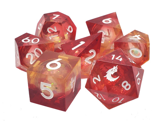 Set of red and orange polyhedral dice with white numbers on a white background