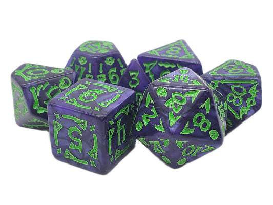 Set of purple polyhedral dice with green numbering on a white background