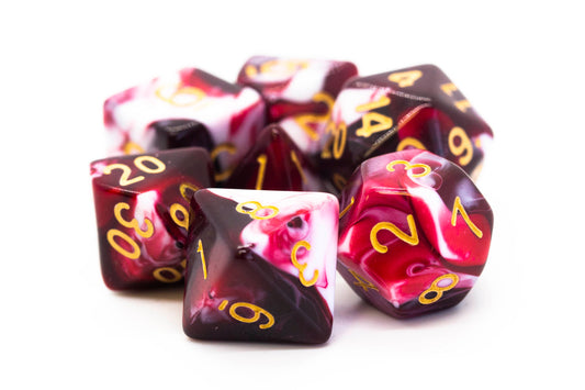 Set of polyhedral dice with red, white, and black color scheme on a white background