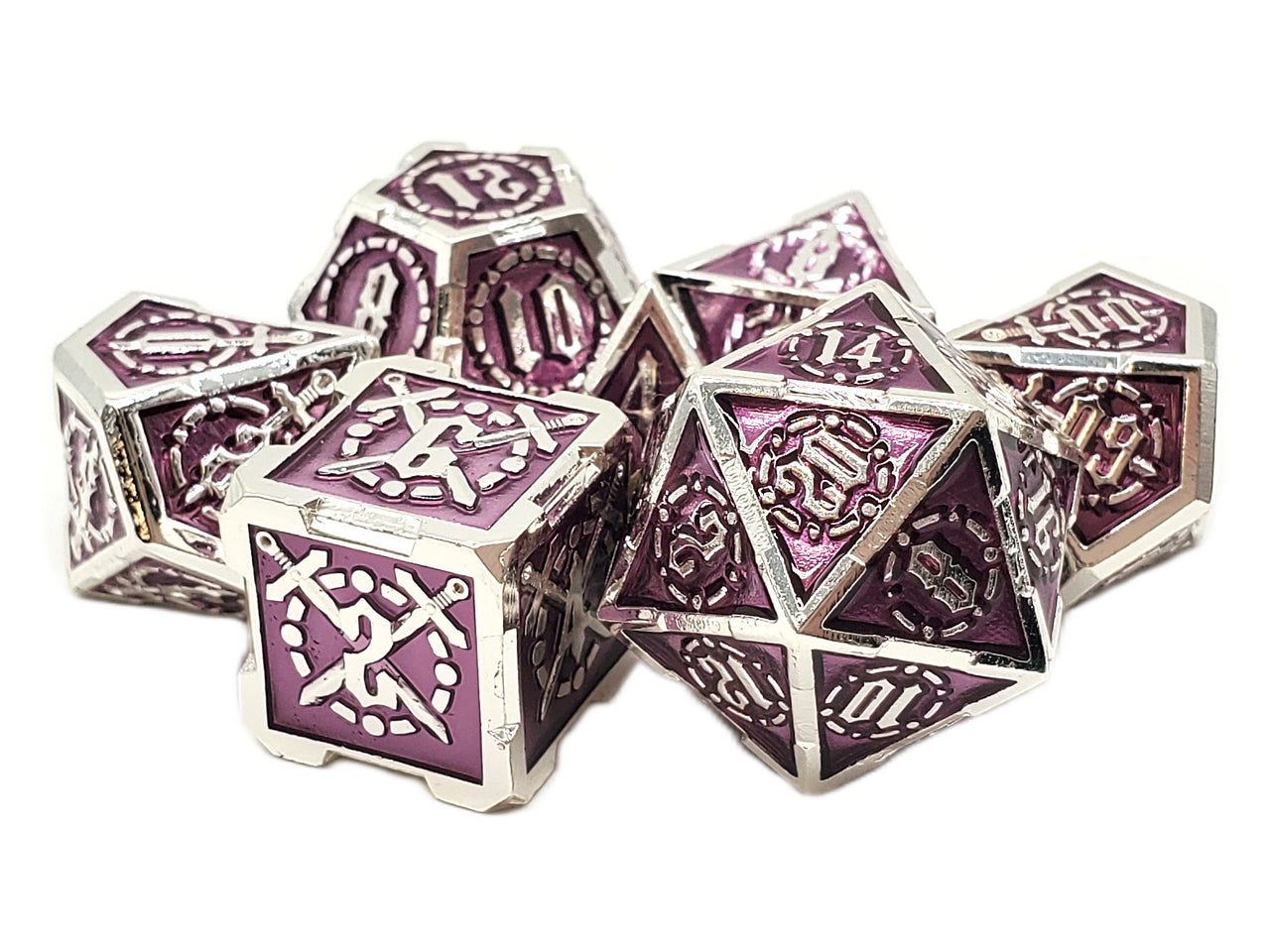 Set of purple and silver metal dice on a white background