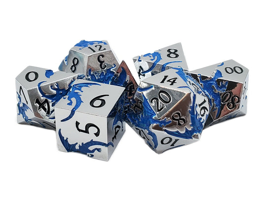 Set of metallic dice with blue and copper accents on a white background