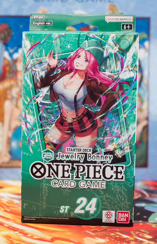 One Piece Card Game Starter Deck ST-24 featuring Jewelry Bonney – vibrant packaging with anime character in red plaid shirt, green hat, and pink hair; Bandai Namco branding; suitable for ages 6+