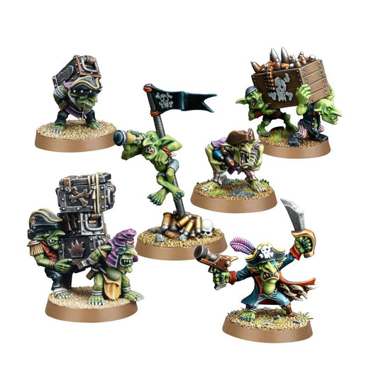 Colorful miniature figurines of fantasy creatures on a white background