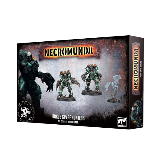 Boxed set of Necromunda: Orrus Spyre Hunters, featuring two cybernetic juggernauts and a small blue winged humanoid creature, known as Caryatid Prime, on a Necromunda 40mm Base.