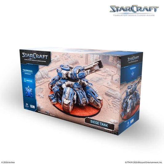 StarCraft tabletop miniature game box for the Tebran Siege Tank, showing the retail packaging with a painted blue and gray siege tank model on the front, photographed on a white background with a faint studio shadow.