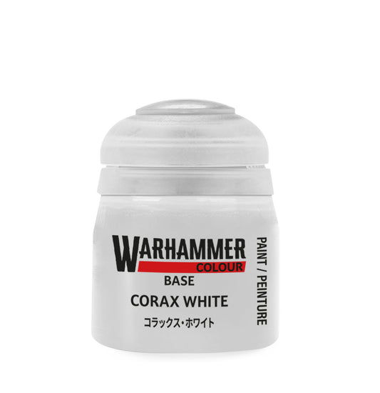 Warhammer paint pot labeled 'Corax White' on a white background