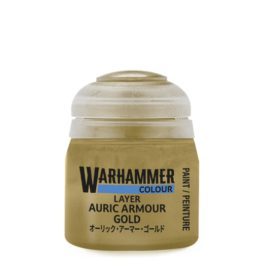 Warhammer paint jar labeled 'Auric Armour Gold' on a white background