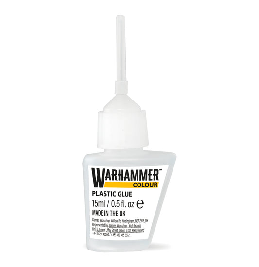 Bottle of Warhammer plastic glue on a white background